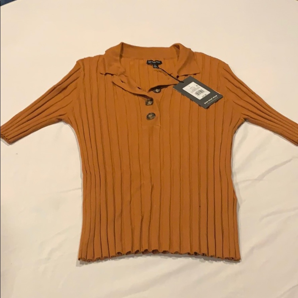 NWT-shirt sleeved, collard shirt. Size: Large